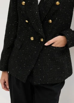 Americana de bouclé con doble botonadura