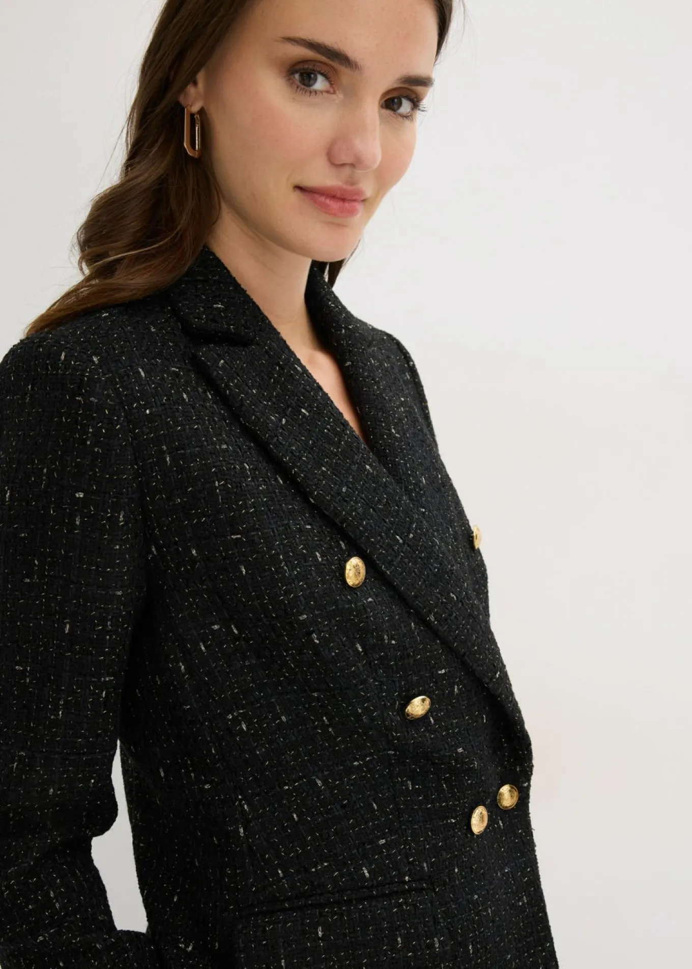 Americana de bouclé con doble botonadura