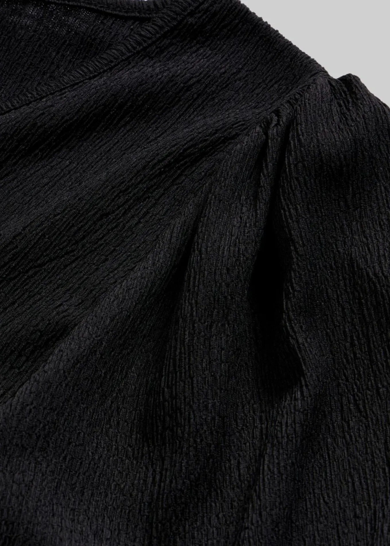 Blusa de crepé estructurado