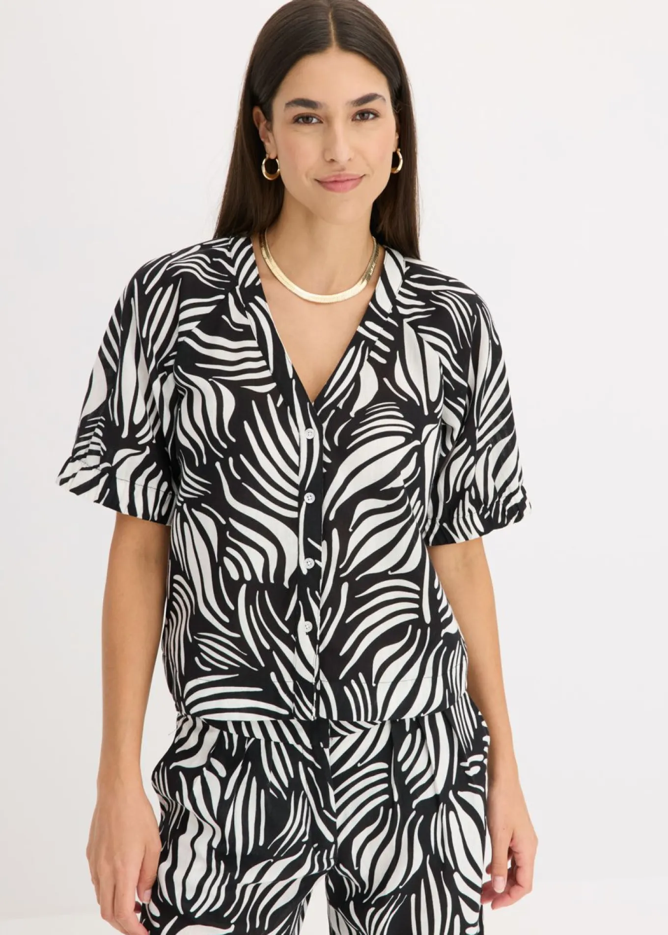 Blusa de manga corta con aspecto de lino