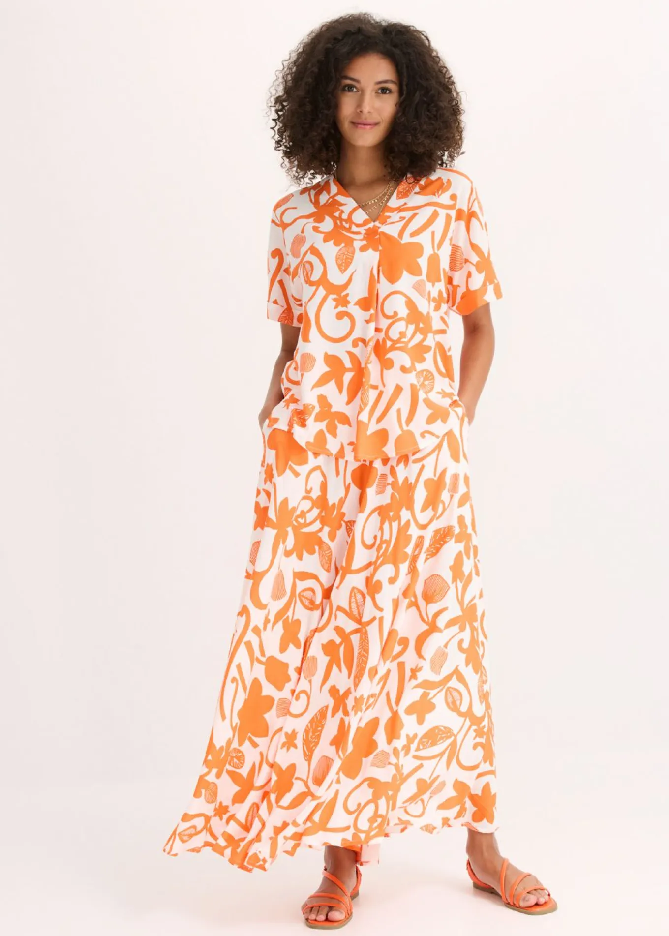 Blusa estampada tipo túnica de viscosa fluida