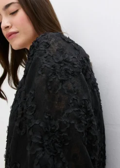 Blusa sin cierre con estampado floral texturizado