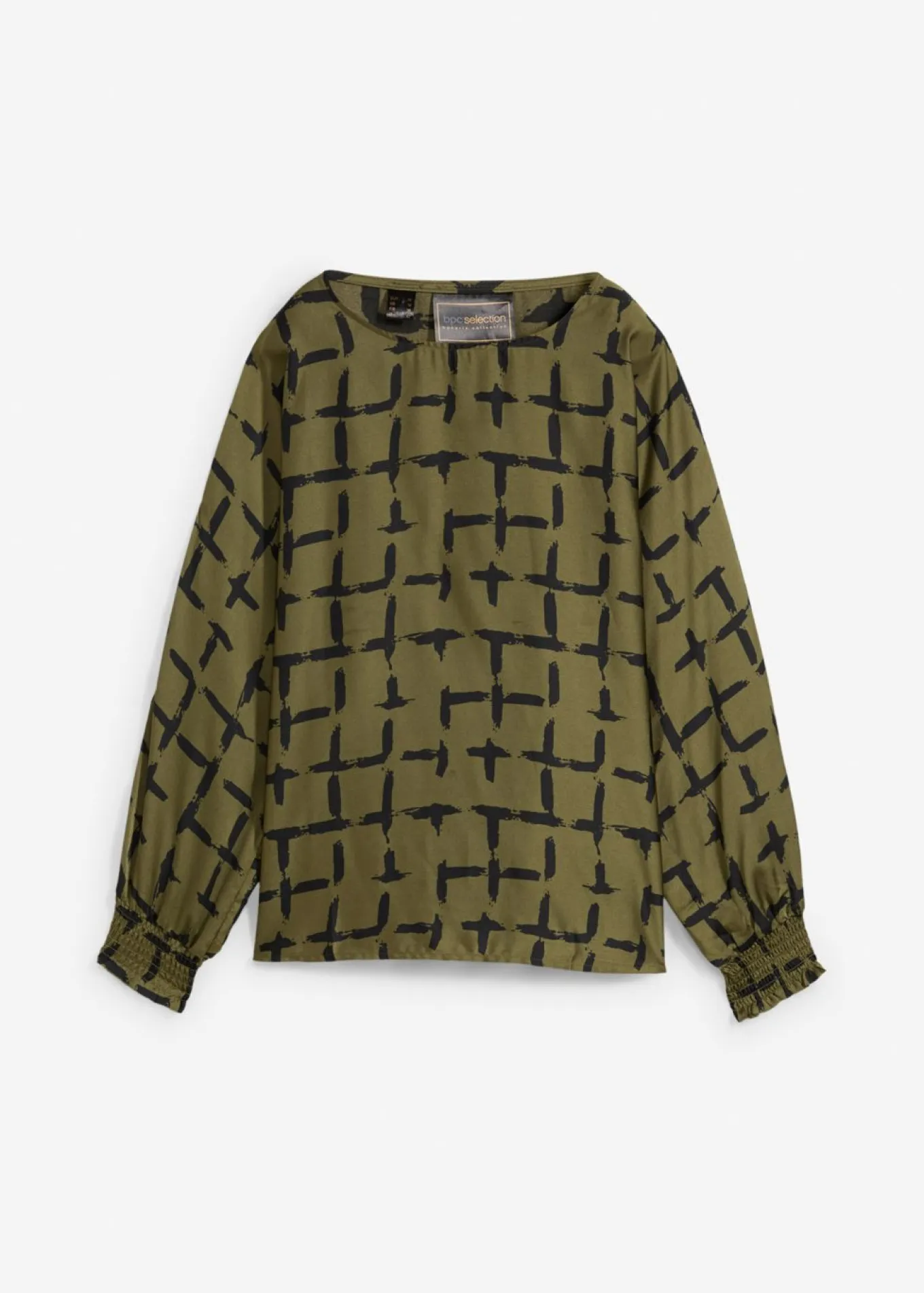 Blusa tipo túnica con mangas de murciélago