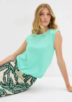 Camiseta con puños elásticos