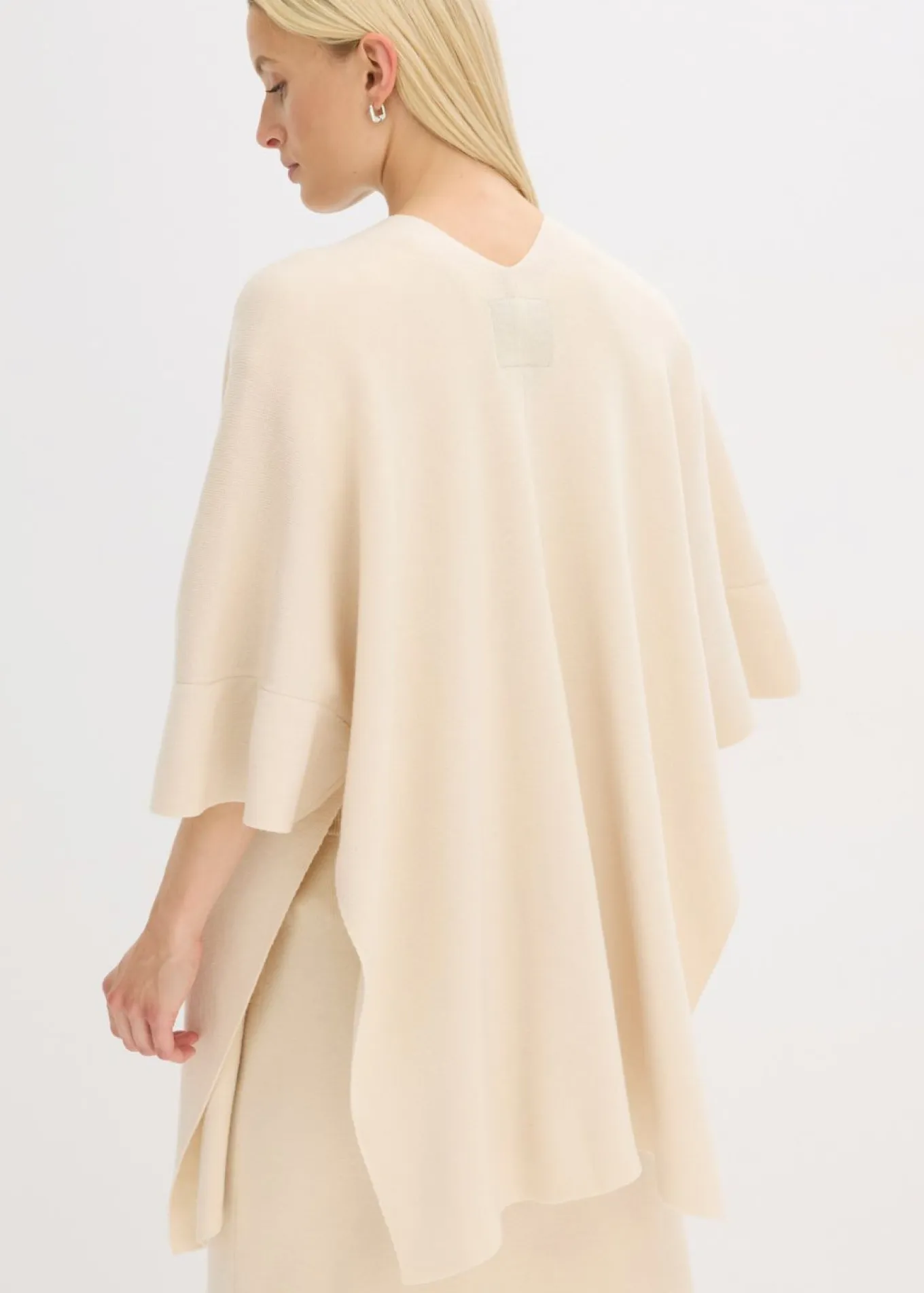 Capa de punto oversize