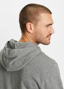 Chaqueta tipo sudadera con capucha y corte cómodo