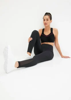 Cómodos leggings deportivos con malla y bolsillo para móvil