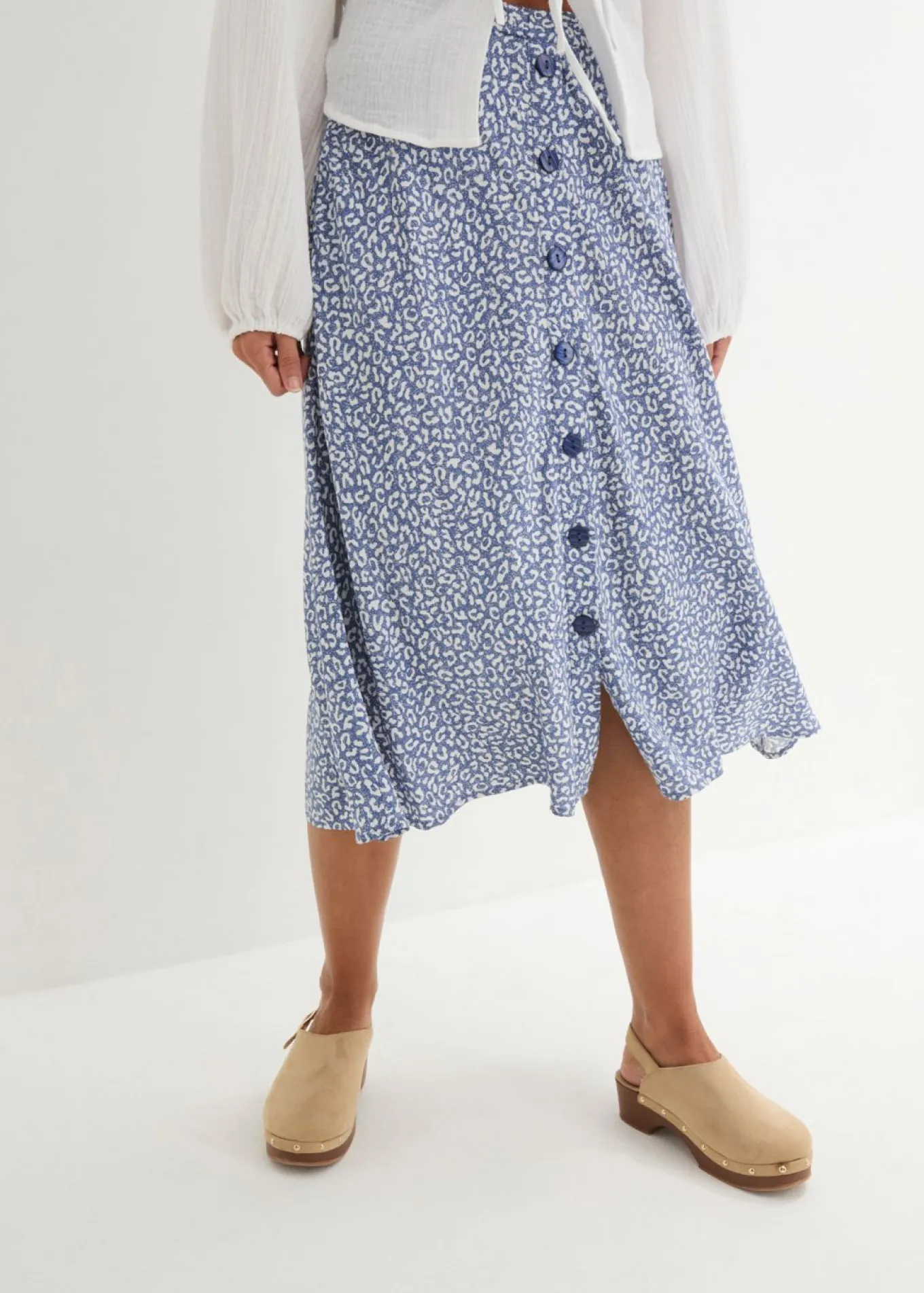 Falda de viscosa hasta la rodilla con bolsillos y cintura cómoda