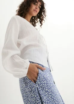 Falda de viscosa hasta la rodilla con bolsillos y cintura cómoda