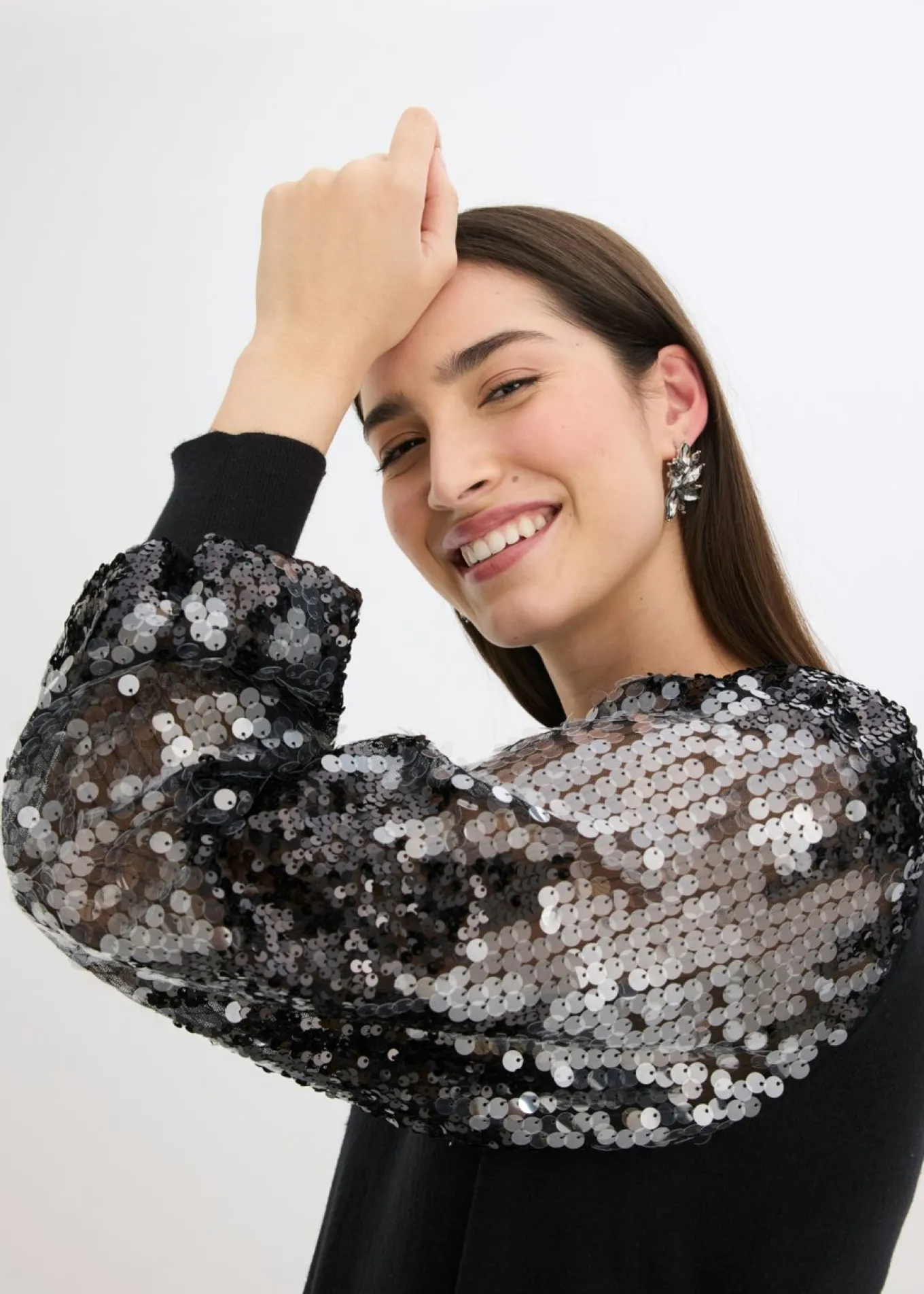 Jersey de punto fino con mangas de lentejuelas