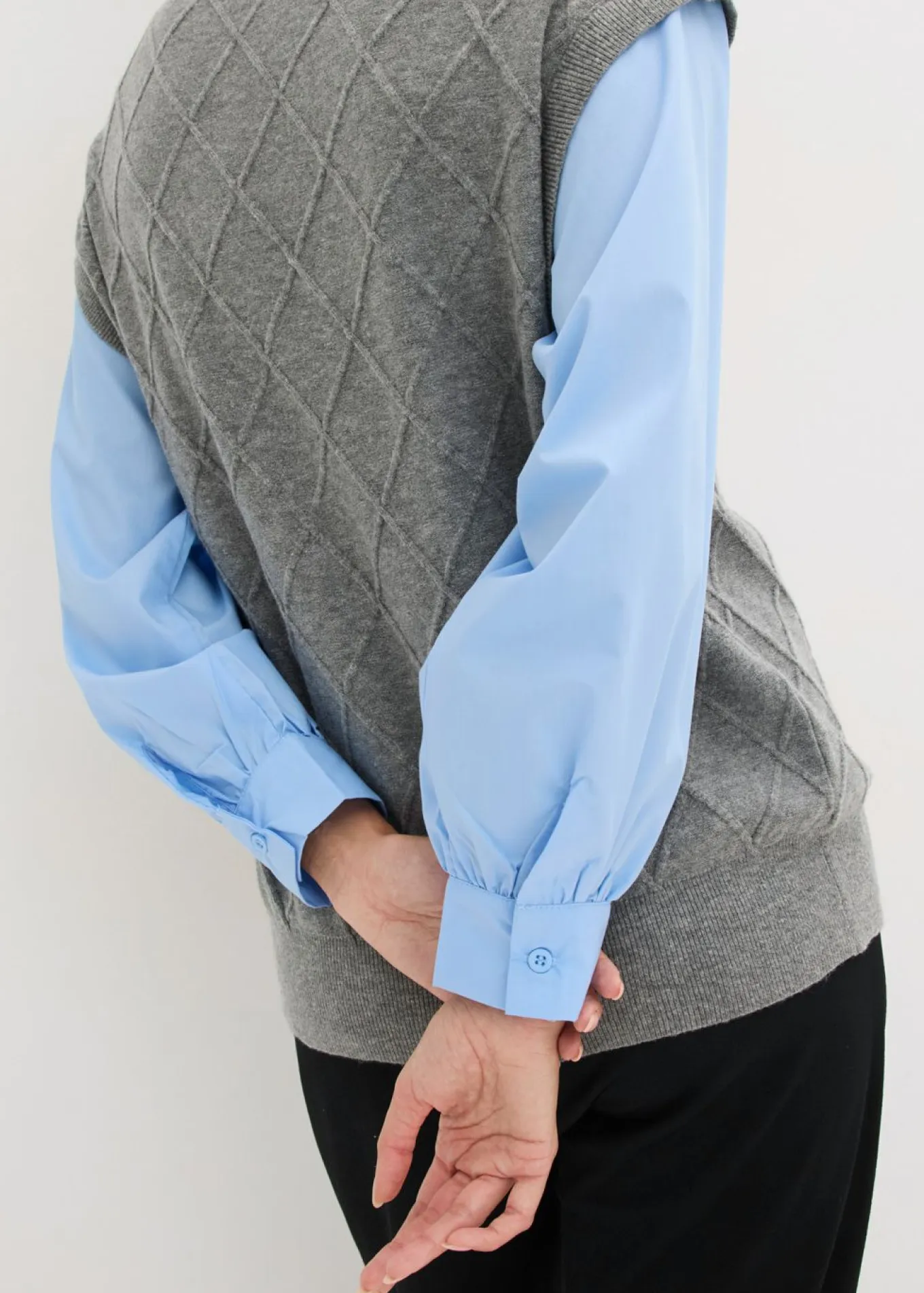 Jersey sin mangas con inserto de blusa y contenido de algodón