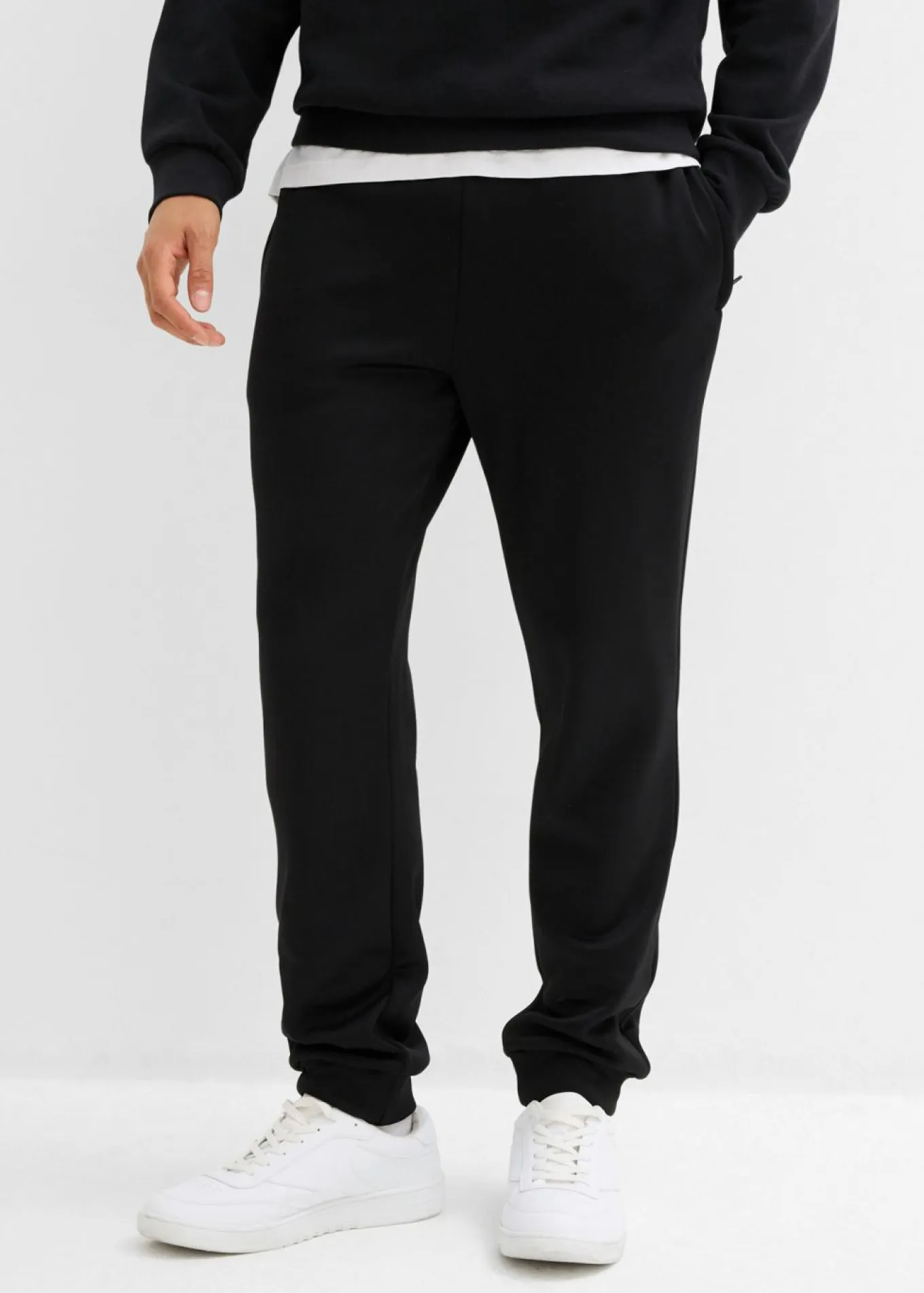 Pantalón de chándal térmico con prácticos bolsillos con cremallera