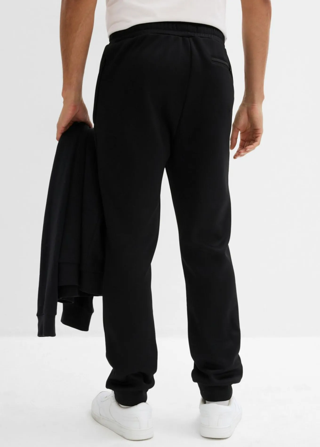 Pantalón de chándal térmico con prácticos bolsillos con cremallera