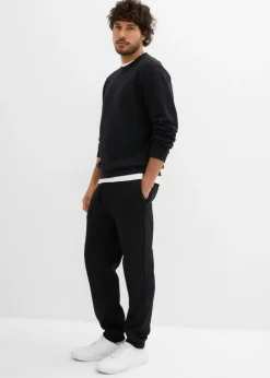 Pantalón de chándal térmico con prácticos bolsillos con cremallera