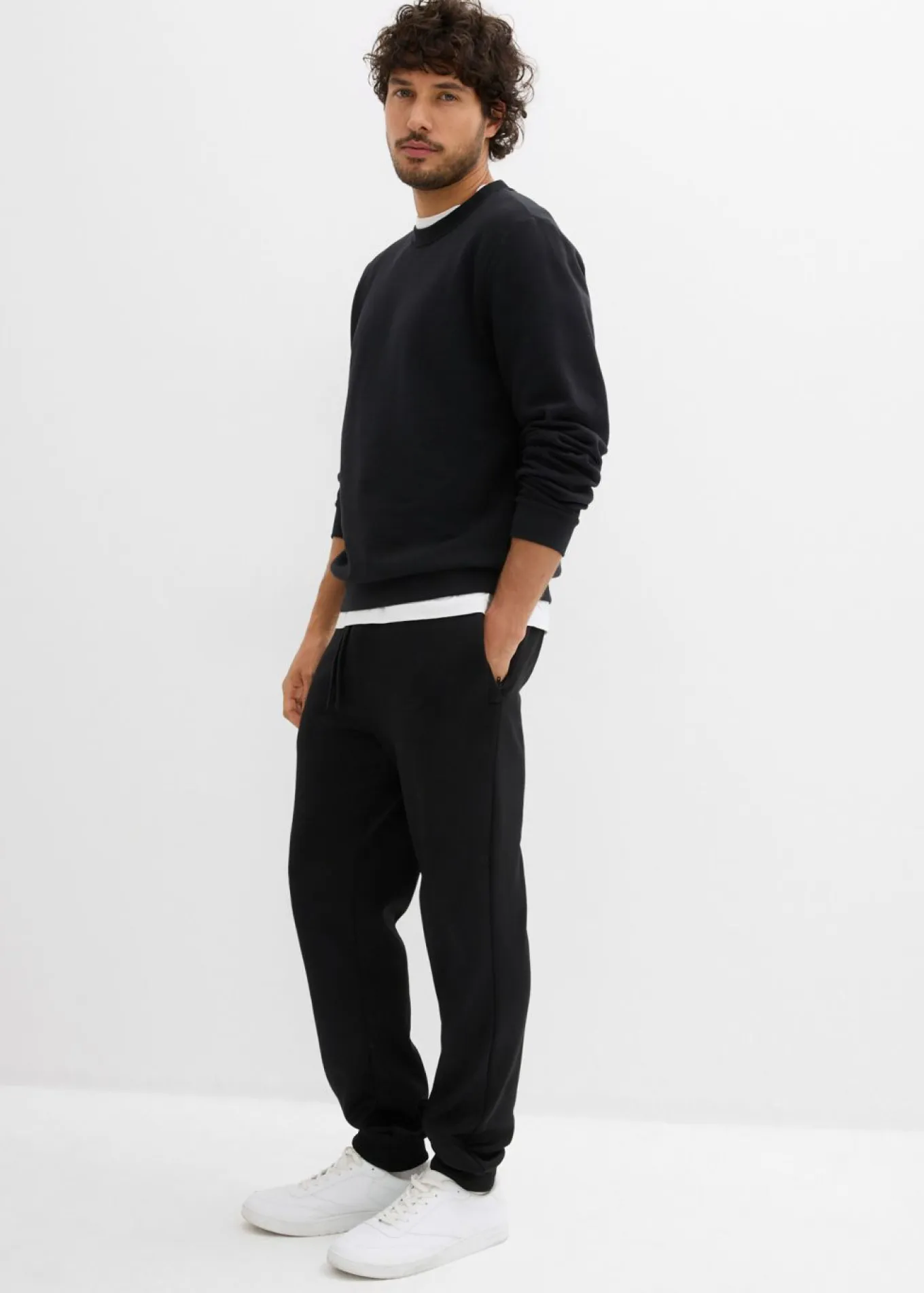 Pantalón de chándal térmico con prácticos bolsillos con cremallera