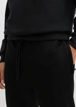 Pantalón de chándal térmico con prácticos bolsillos con cremallera