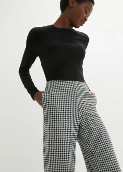 Pantalón elástico con pata de gallo, pernera ancha