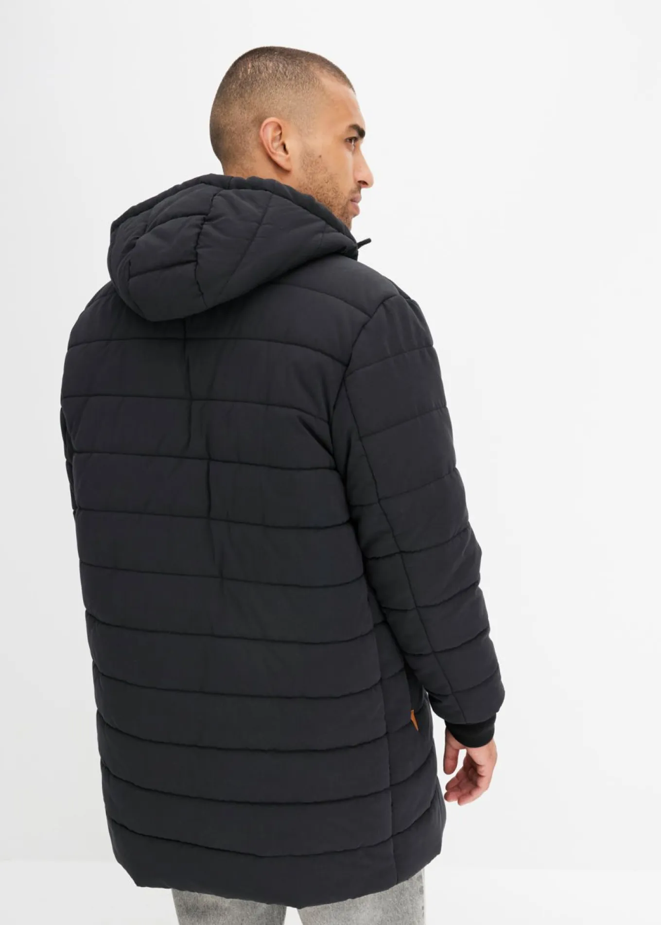 Parka acolchada con capucha y detalles de piel sintética