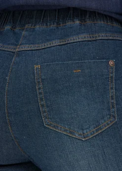 Vaqueros de algodón con talle medio y corte slim