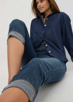 Vaqueros de algodón con talle medio y corte slim