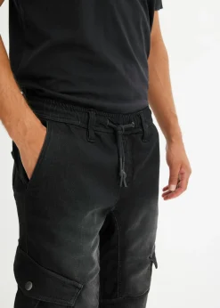 Vaqueros informales con corte regular, forma recta y cinturilla elástica