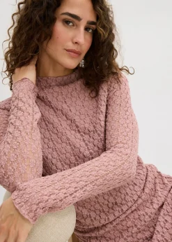 Vestido de encaje con dobladillo irregular