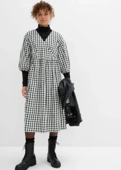 Vestido midi con corte holgado