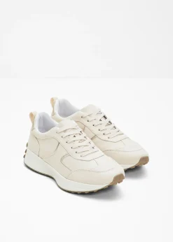 Zapatillas deportivas con detalles metálicos