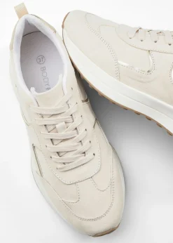 Zapatillas deportivas con detalles metálicos
