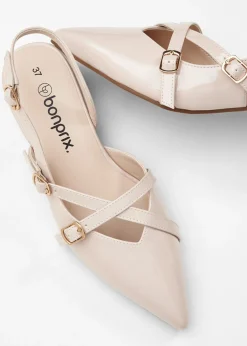 Zapatos de tacón con talón al descubierto